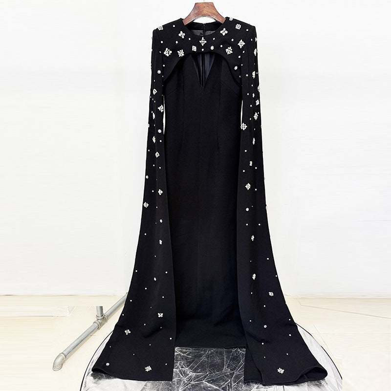 Elegant Evening Dress with Trailing Cape