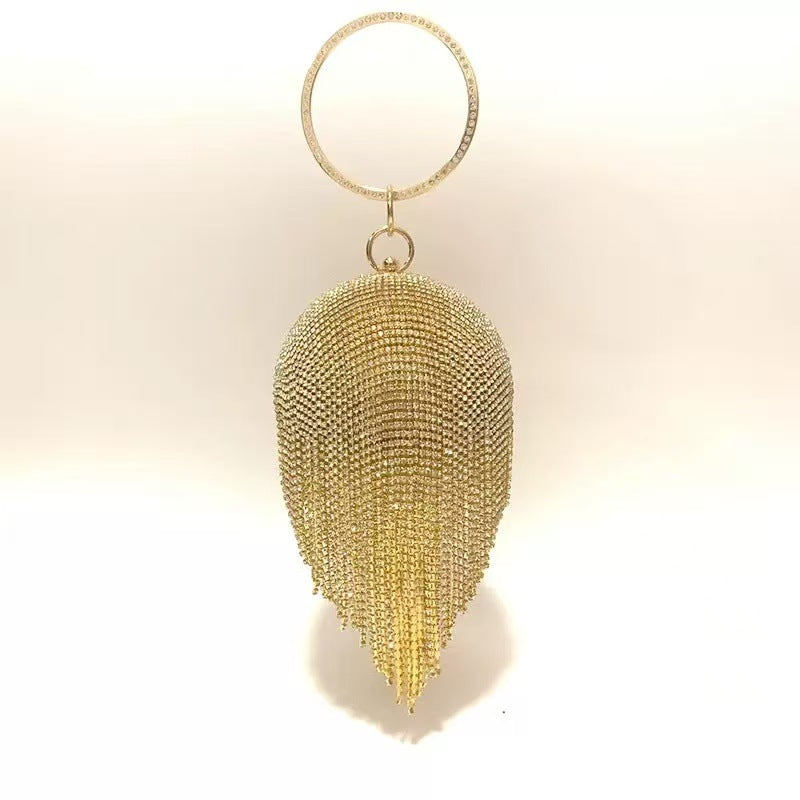 Cascading Tassel Spherical Evening Bag — hem detail
