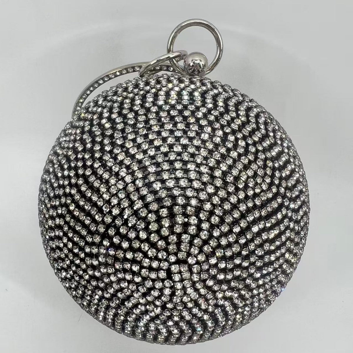 Cascading Tassel Spherical Evening Bag — fabric and detail