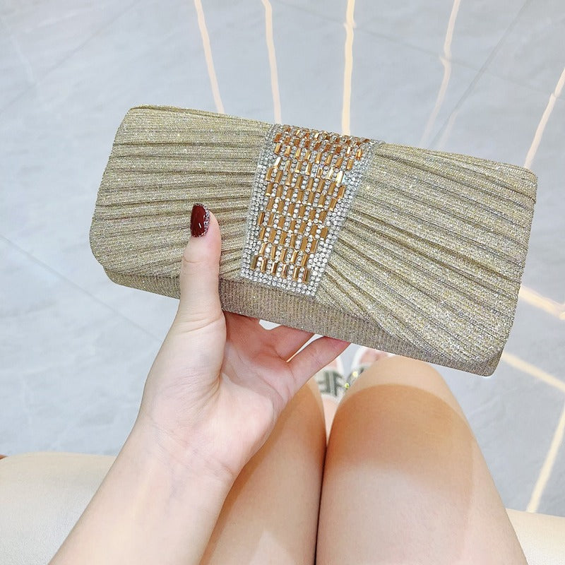 Crystal Band Pleated Evening Clutch — model wearing
