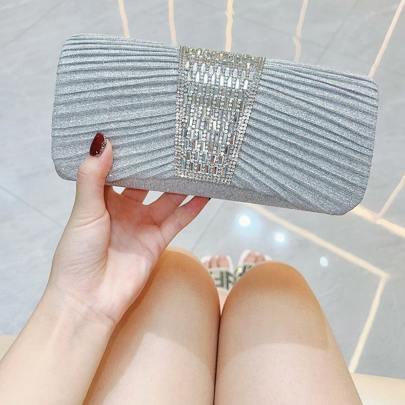Crystal Band Pleated Evening Clutch — runway angle
