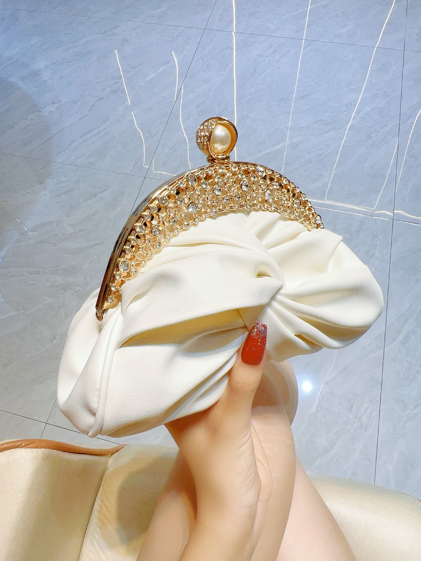 Diamond-Encrusted Pleated Clutch with Pearl Clasp — full length