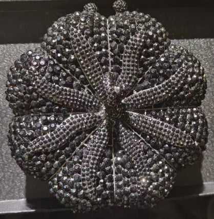 Diamond-Encrusted Signature Banquet Clutch — model wearing