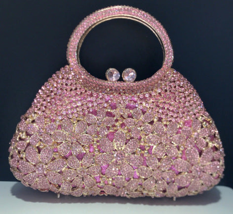 Diamond-Encrusted Signature Banquet Clutch — model wearing
