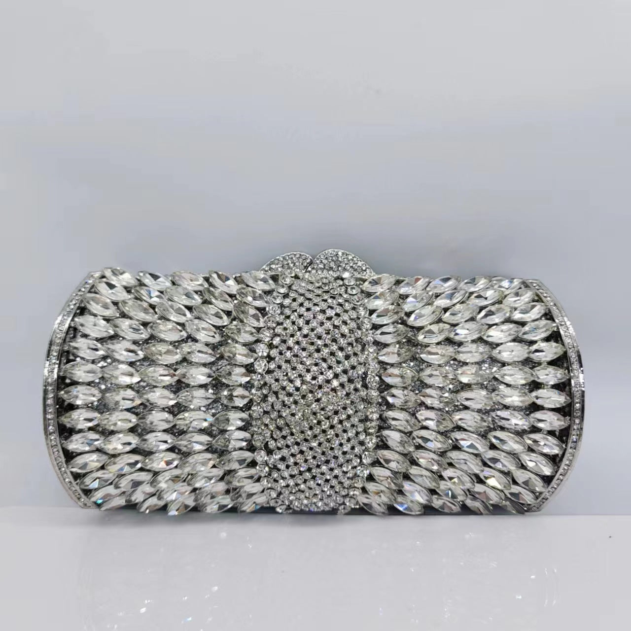 Diamond-Encrusted Signature Banquet Clutch — hem detail