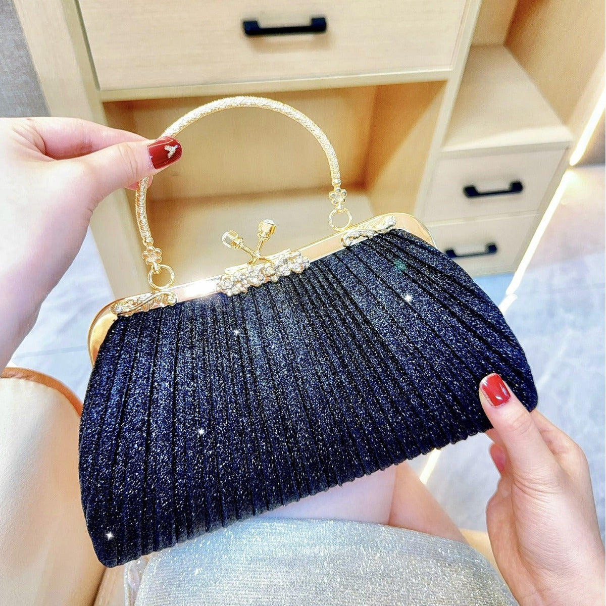 Diamond Tassel Pleated Evening Clutch — model wearing