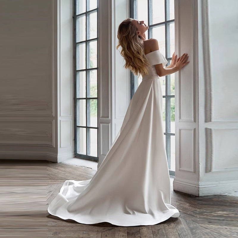European and American one-shoulder wedding dresses 2026 new white forest simple satin detachable trailing light wedding dress — fabric and detail