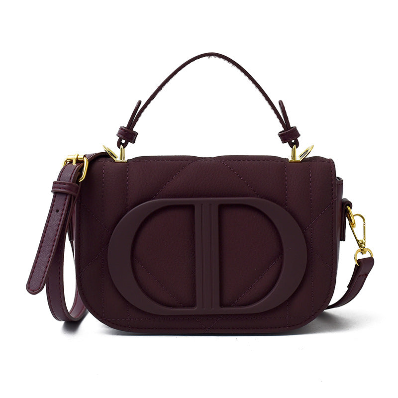 Retro Italian-Inspired Saddle Crossbody Bag — model wearing