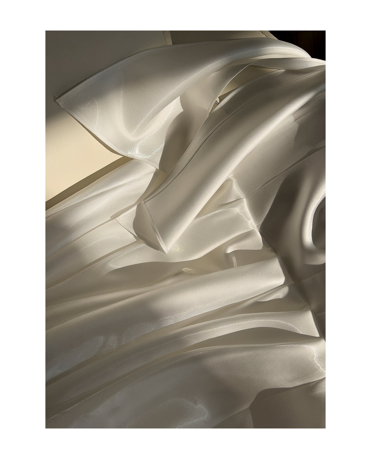 Mireille Black Satin Strapless Dress — hem detail