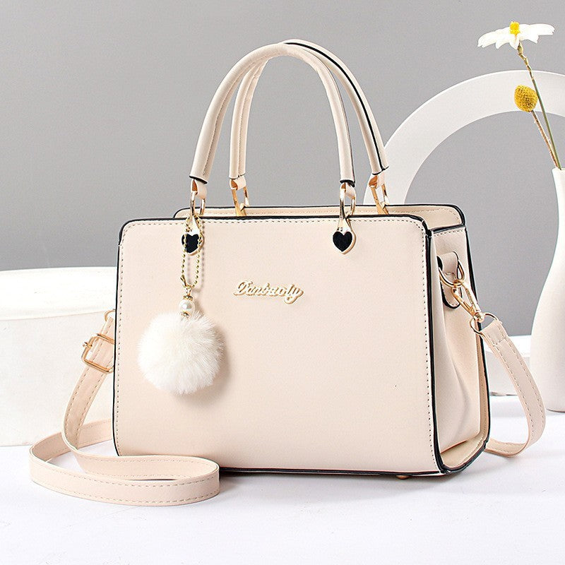 Clio Textured Chain-Strap Crossbody Bag — styled look