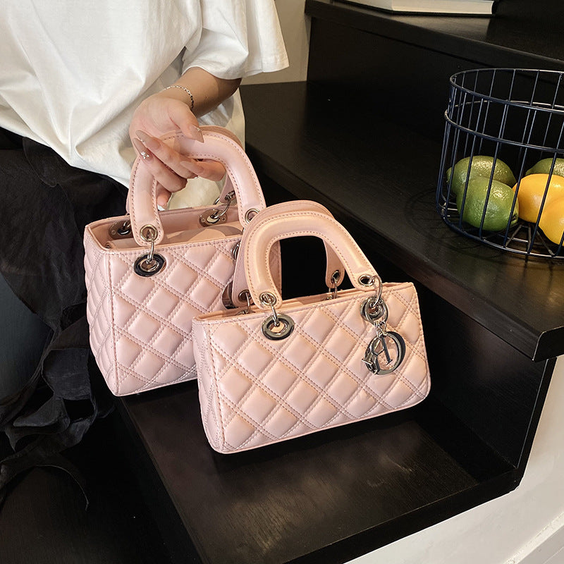 Quilted Embroidered Crossbody Bag — front view