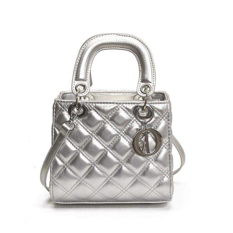 Quilted Embroidered Crossbody Bag — trim detail