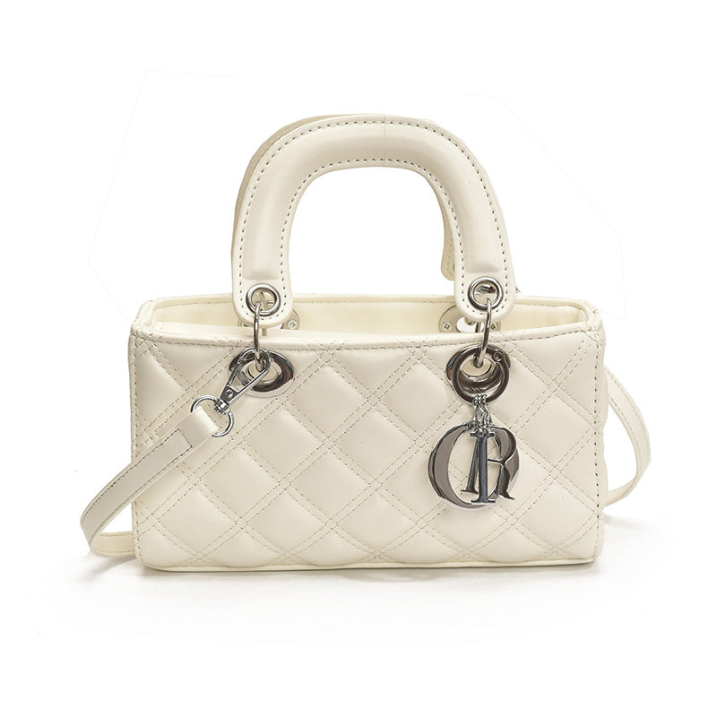 Quilted Embroidered Crossbody Bag — close-up detail