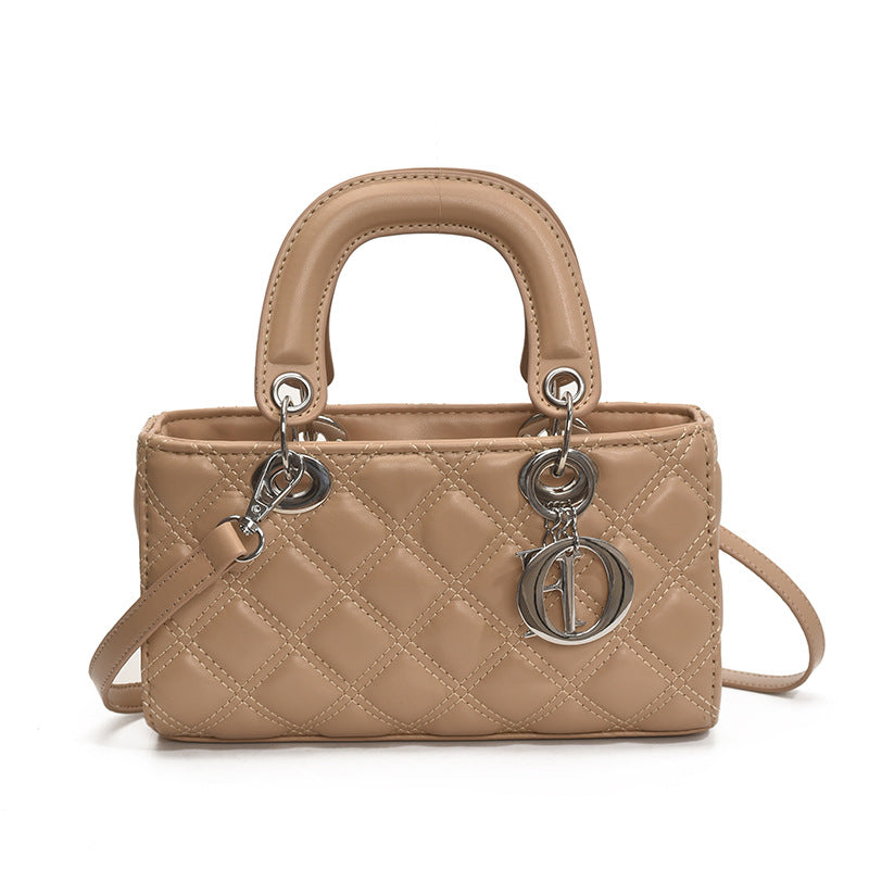 Quilted Embroidered Crossbody Bag — model wearing