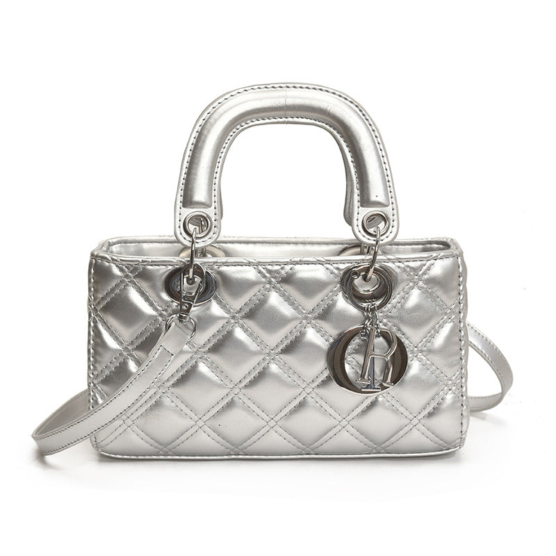 Quilted Embroidered Crossbody Bag — runway angle