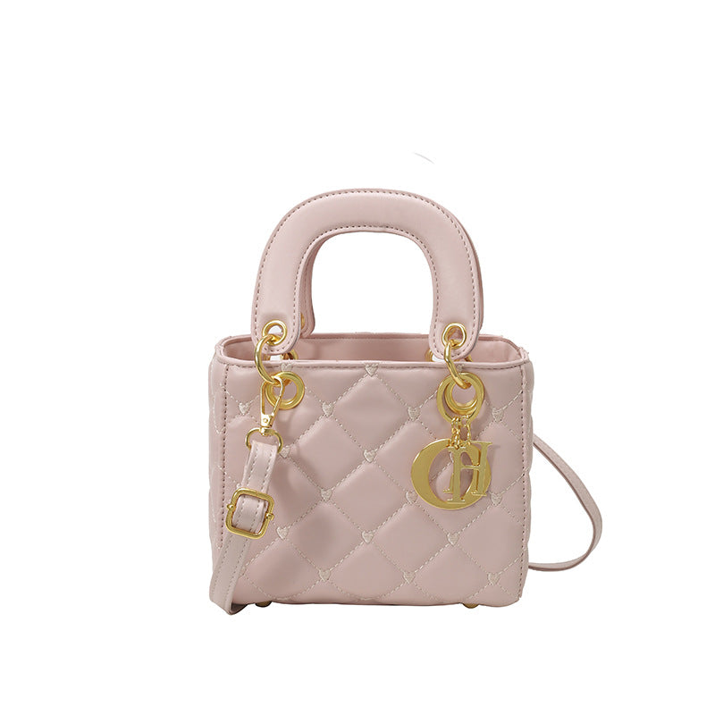 Quilted Diamond Lattice Mini Handbag with Pearl Charm — silhouette