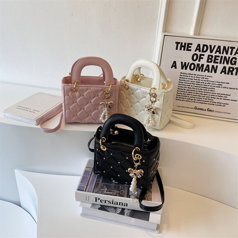Quilted Diamond Lattice Mini Handbag with Pearl Charm — full length