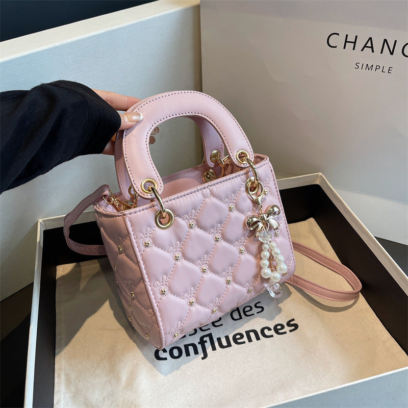Quilted Diamond Lattice Mini Handbag with Pearl Charm — styled look