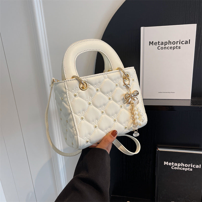 Quilted Diamond Lattice Mini Handbag with Pearl Charm — fabric and detail