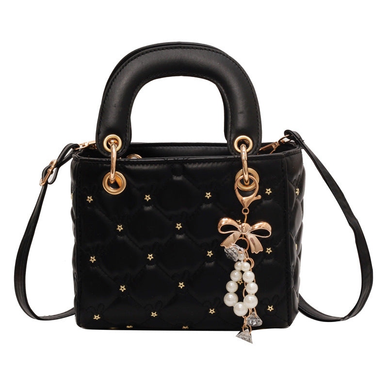 Quilted Diamond Lattice Mini Handbag with Pearl Charm — side view