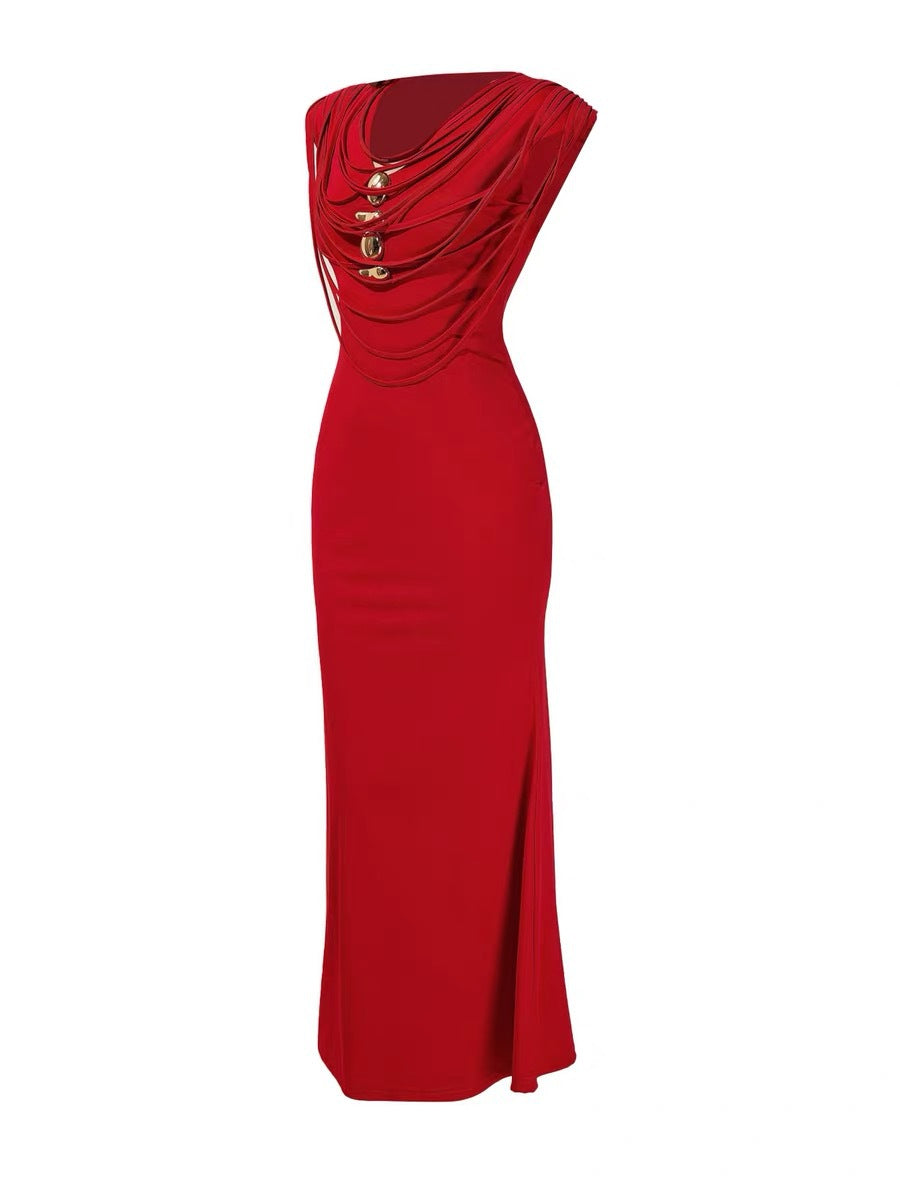 Red draped cord collar gown on a plain background