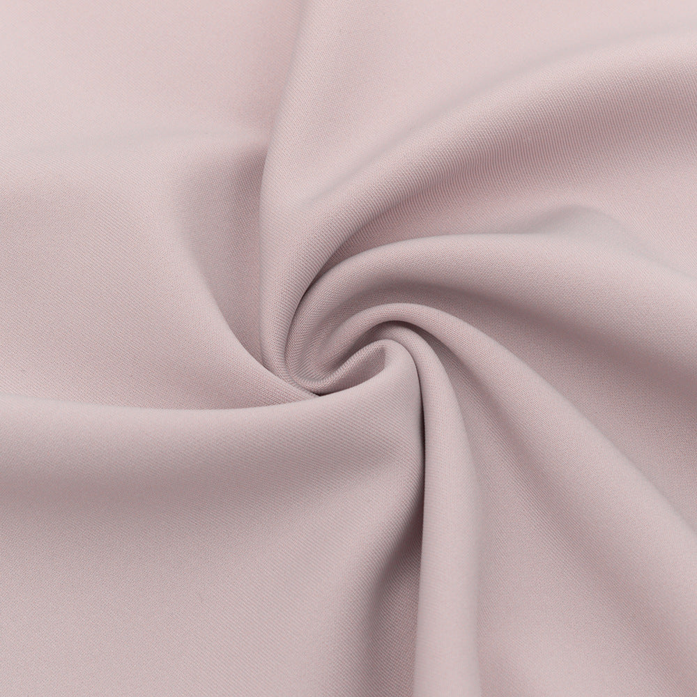 Marceline blush lace-corset strapless evening gown — close-up of the smooth blush fabric
