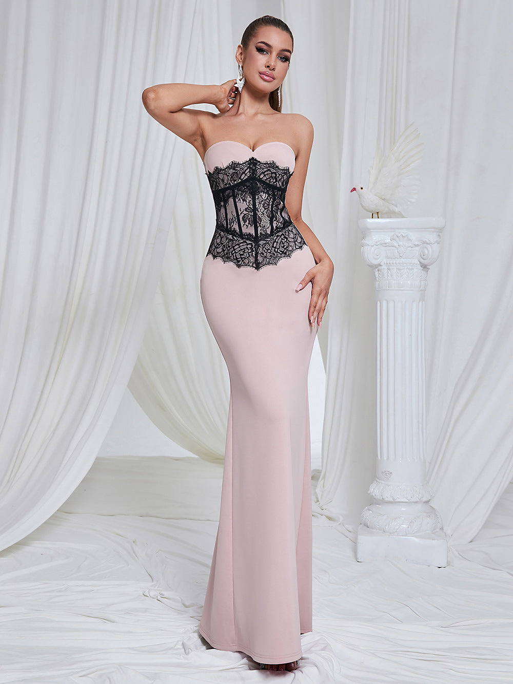 Marceline blush lace-corset strapless evening gown — third front view on model