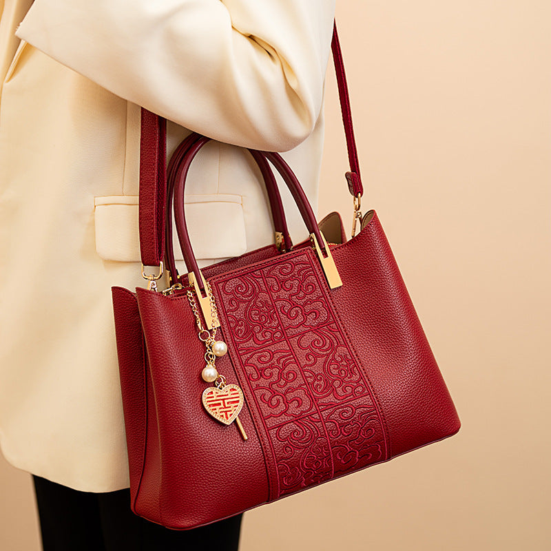 Luna Signature Structured Handbag — styled look