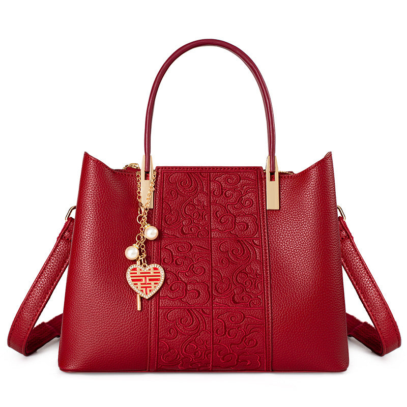 Luna Signature Structured Handbag — back view