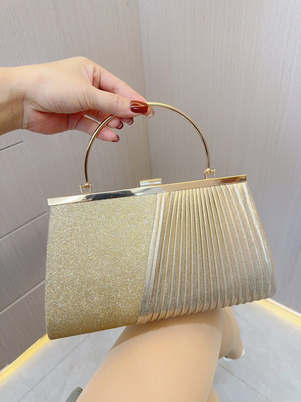Sparkling Pleated Frame Clutch with Half-Ring Handle — front view