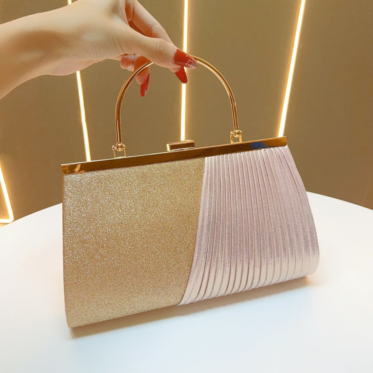 Sparkling Pleated Frame Clutch with Half-Ring Handle — silhouette