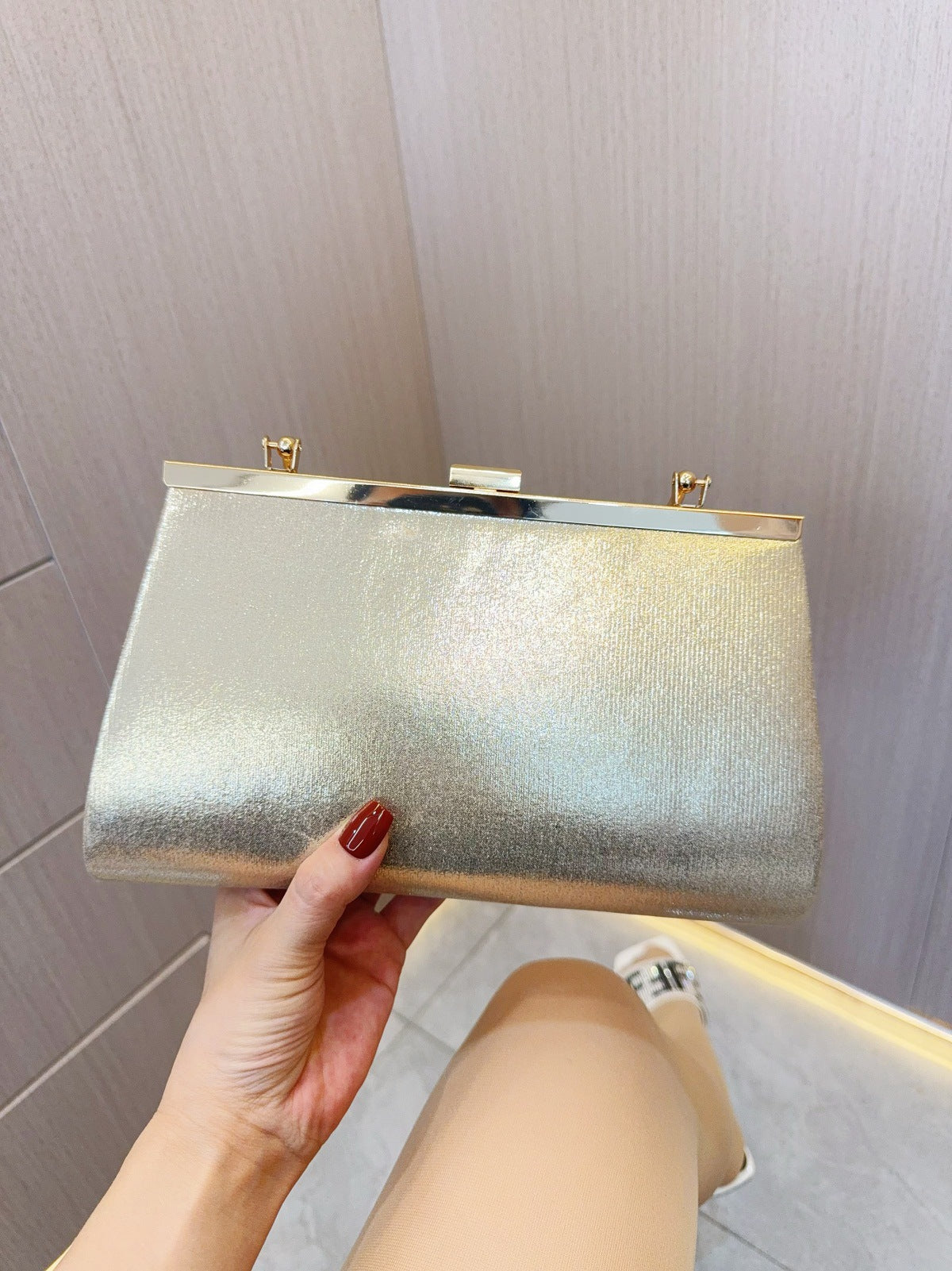 Sparkling Pleated Frame Clutch with Half-Ring Handle — styled look