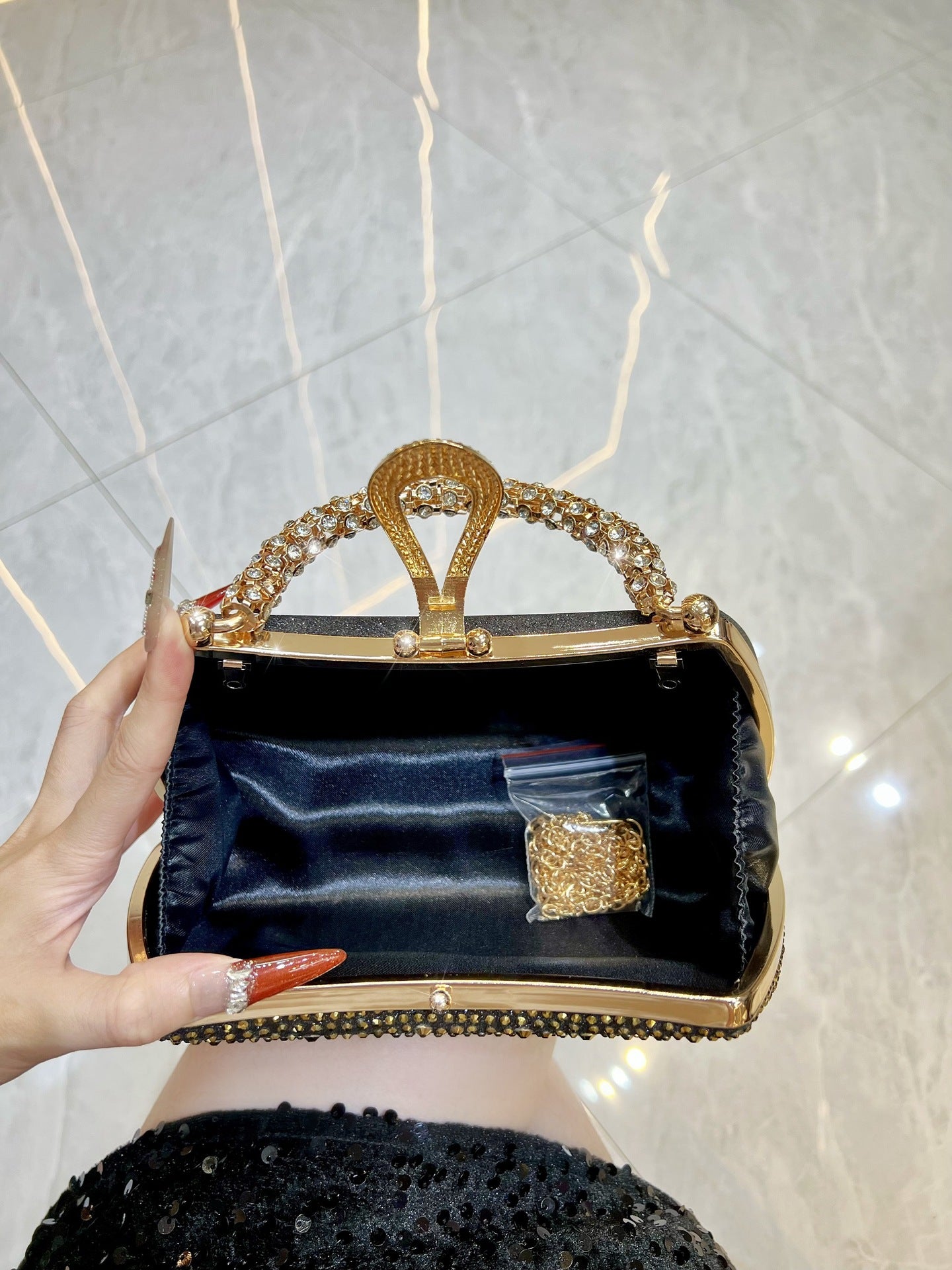 Rhinestone-Covered Evening Bag with Crystal Handle — styled look