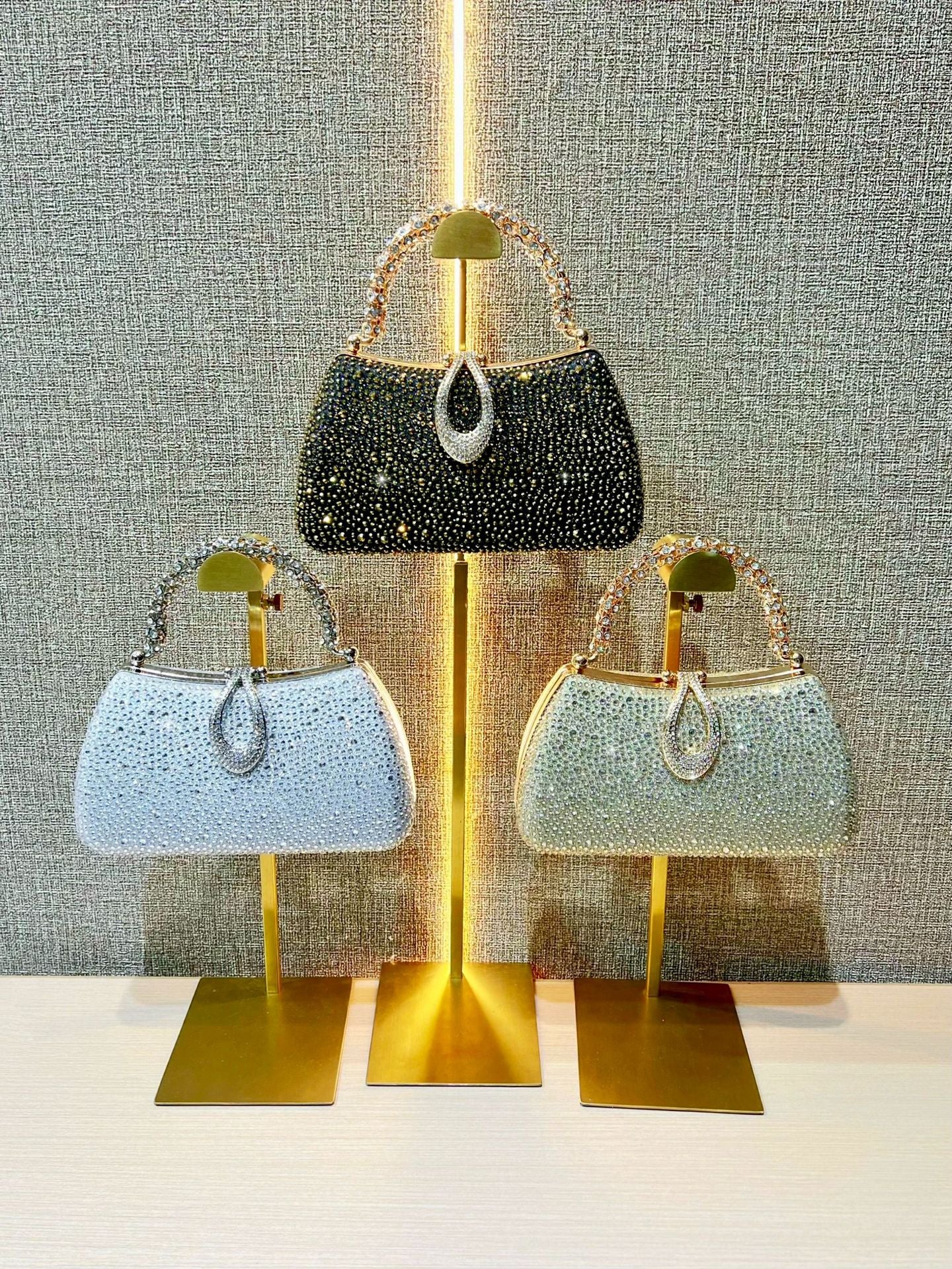 Rhinestone-Covered Evening Bag with Crystal Handle — fabric and detail