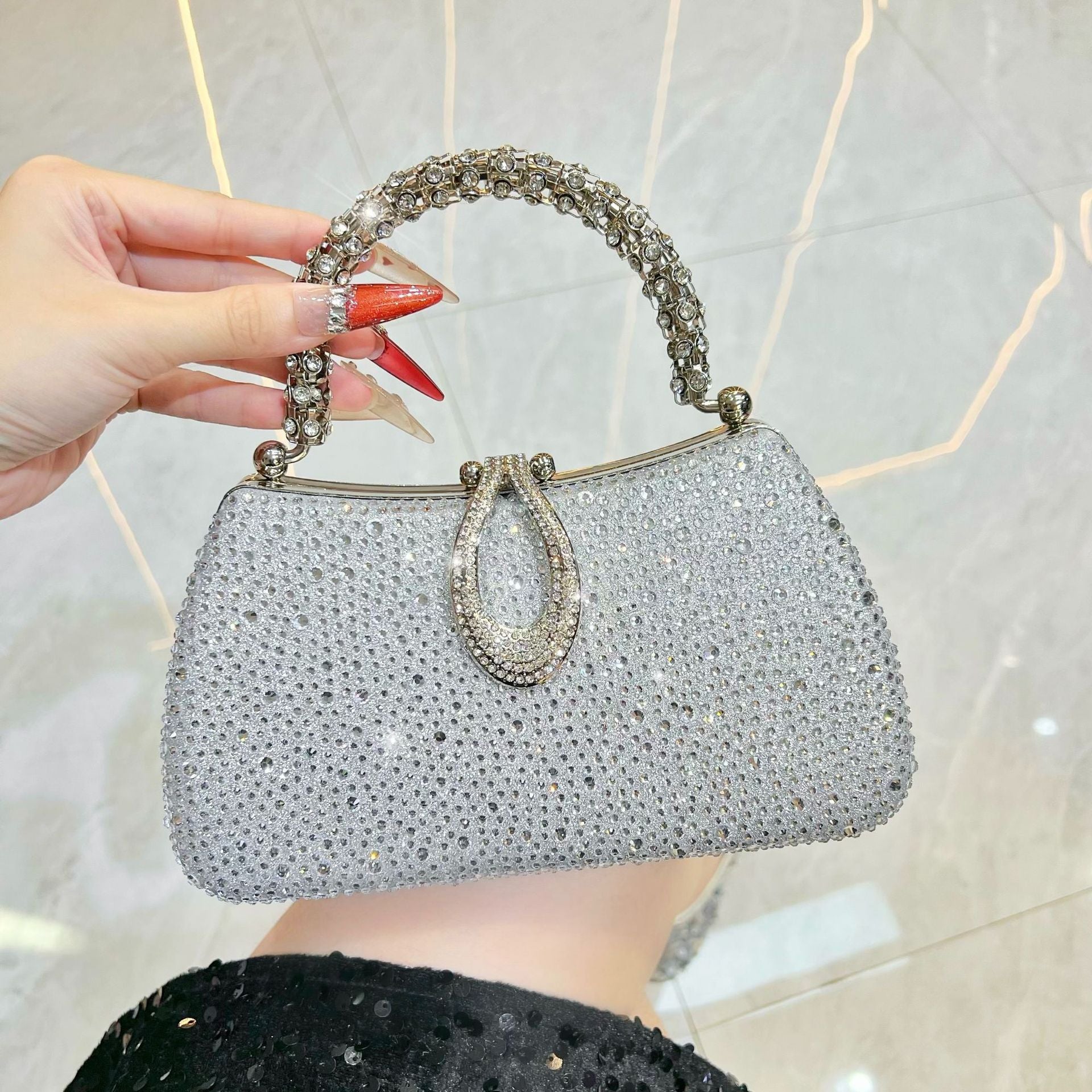 Rhinestone-Covered Evening Bag with Crystal Handle — model wearing