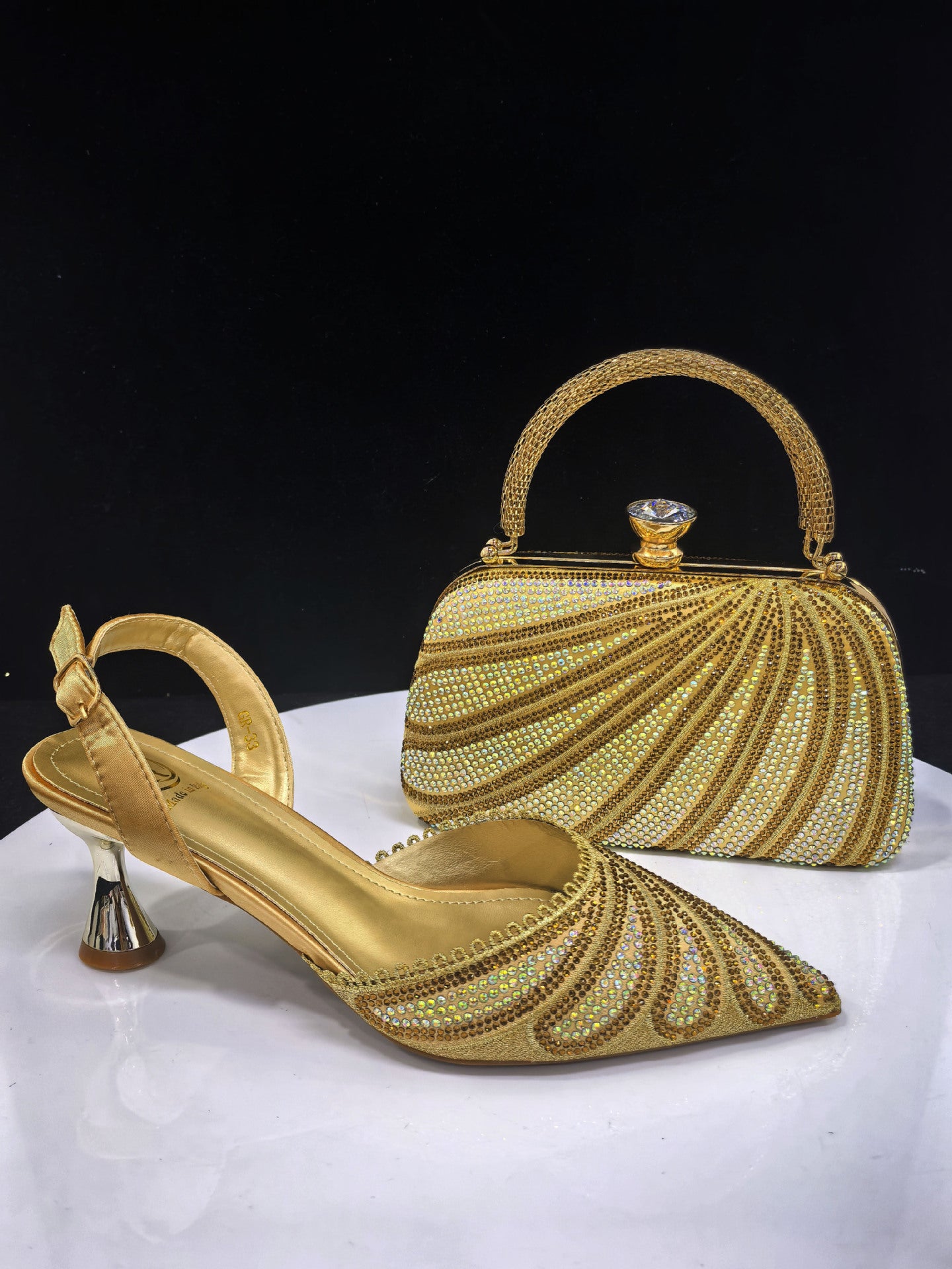 Pointed-Toe Heels & Designer Box Bag Set — close-up detail