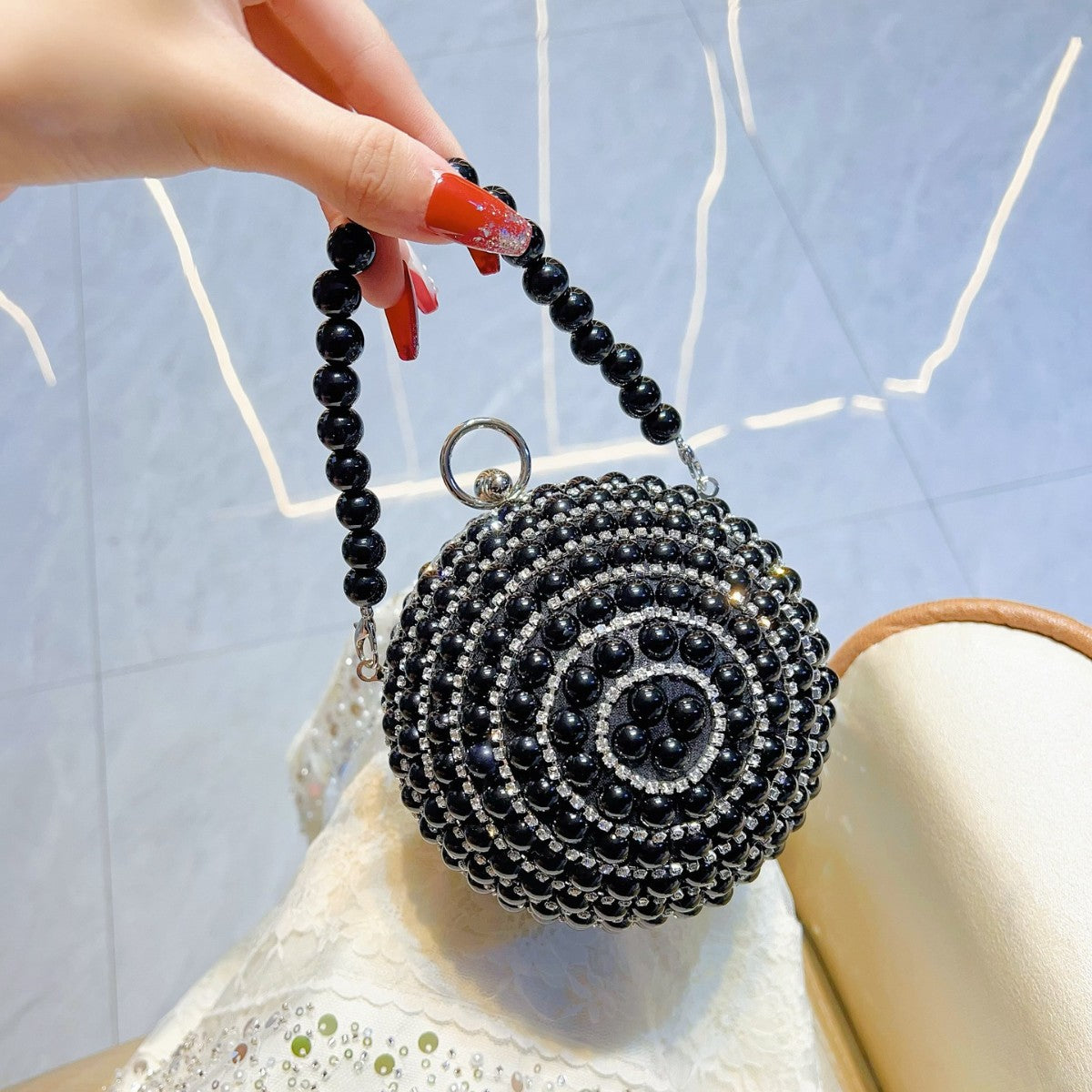 Pearl-Encrusted Italian-Inspired Spherical Evening Bag — close-up detail