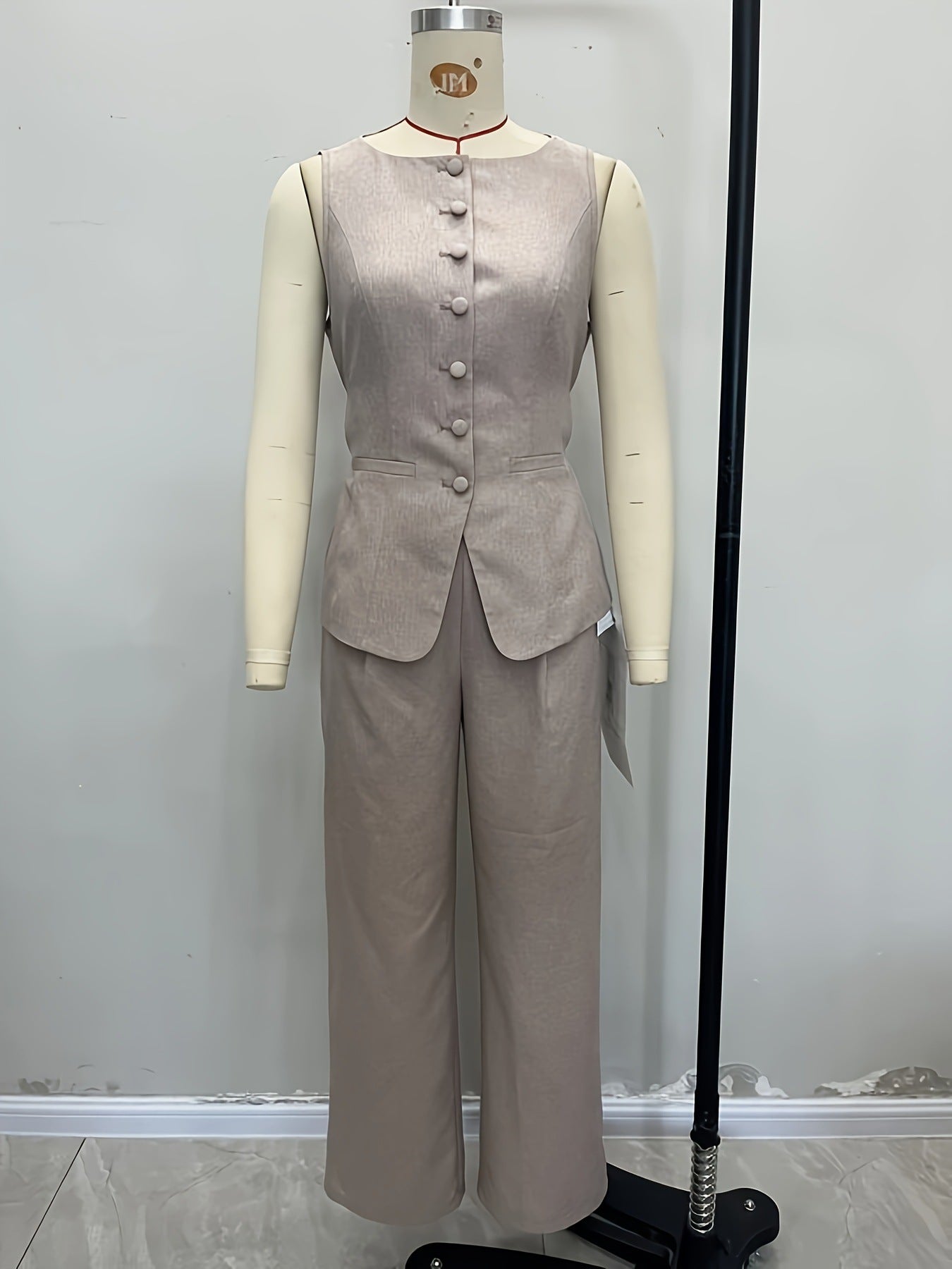 Philippine button vest and wide-leg trouser set in grey — front view on mannequin