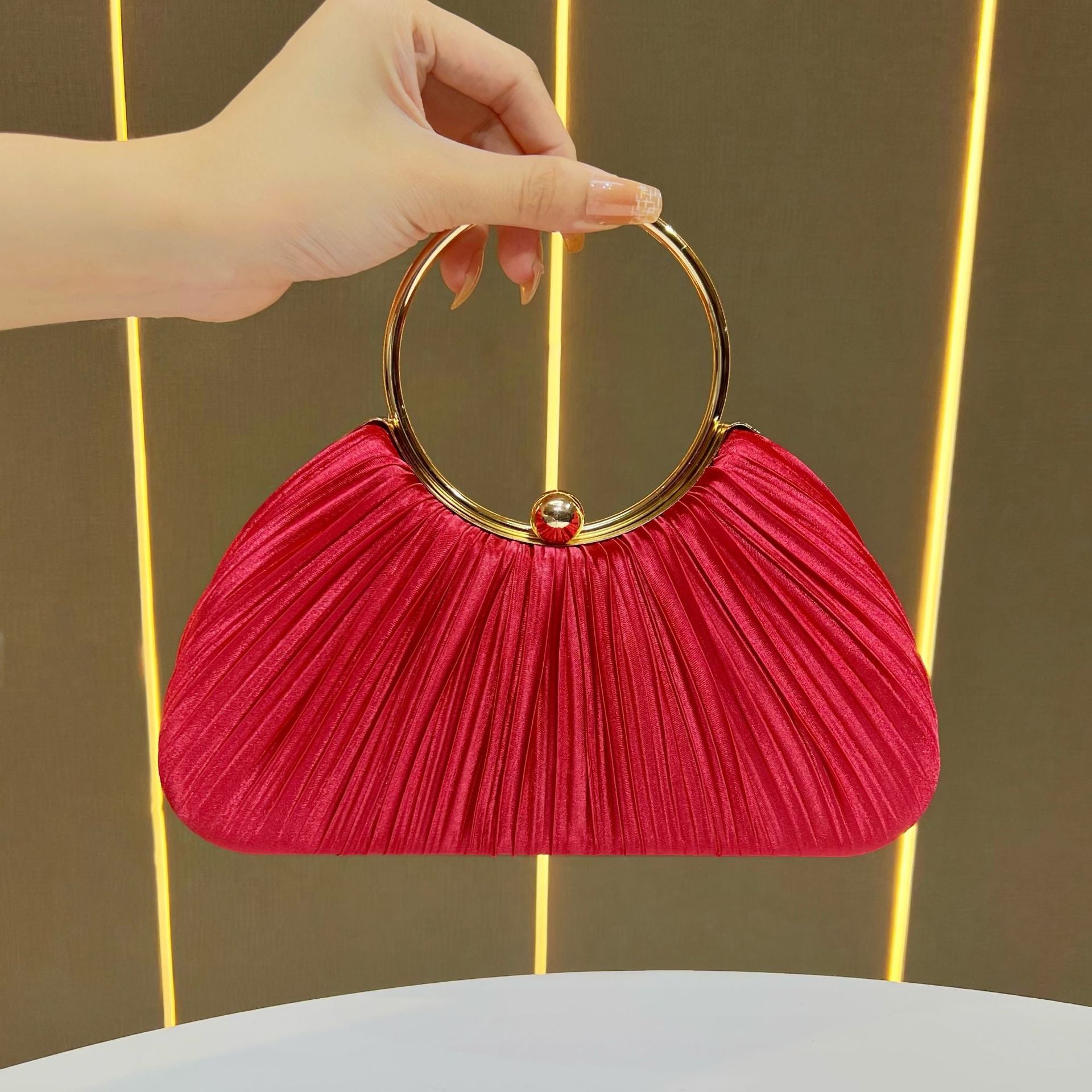 Pleated Satin Evening Bag with Gold Ring Handle — trim detail