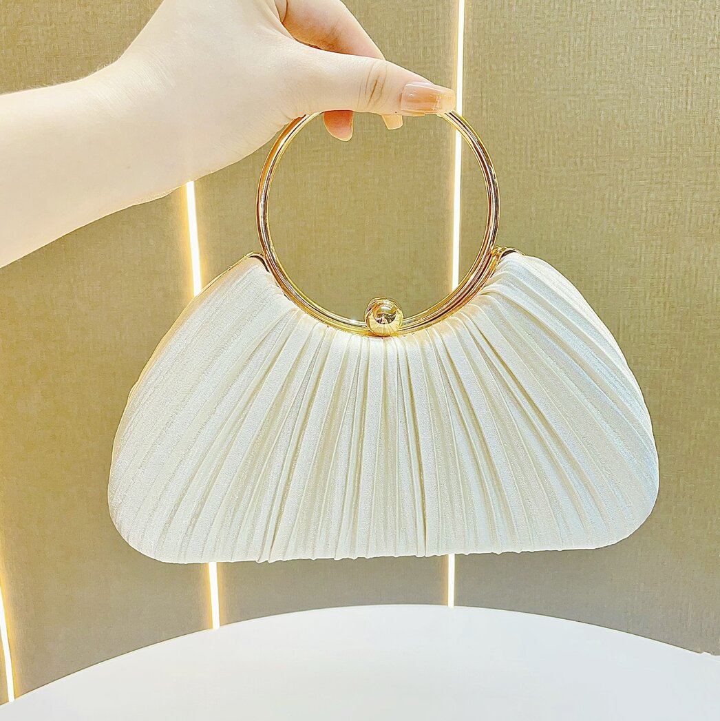Pleated Satin Evening Bag with Gold Ring Handle — runway angle