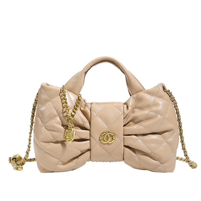 Quilted Bow Chain Evening Bag — runway angle