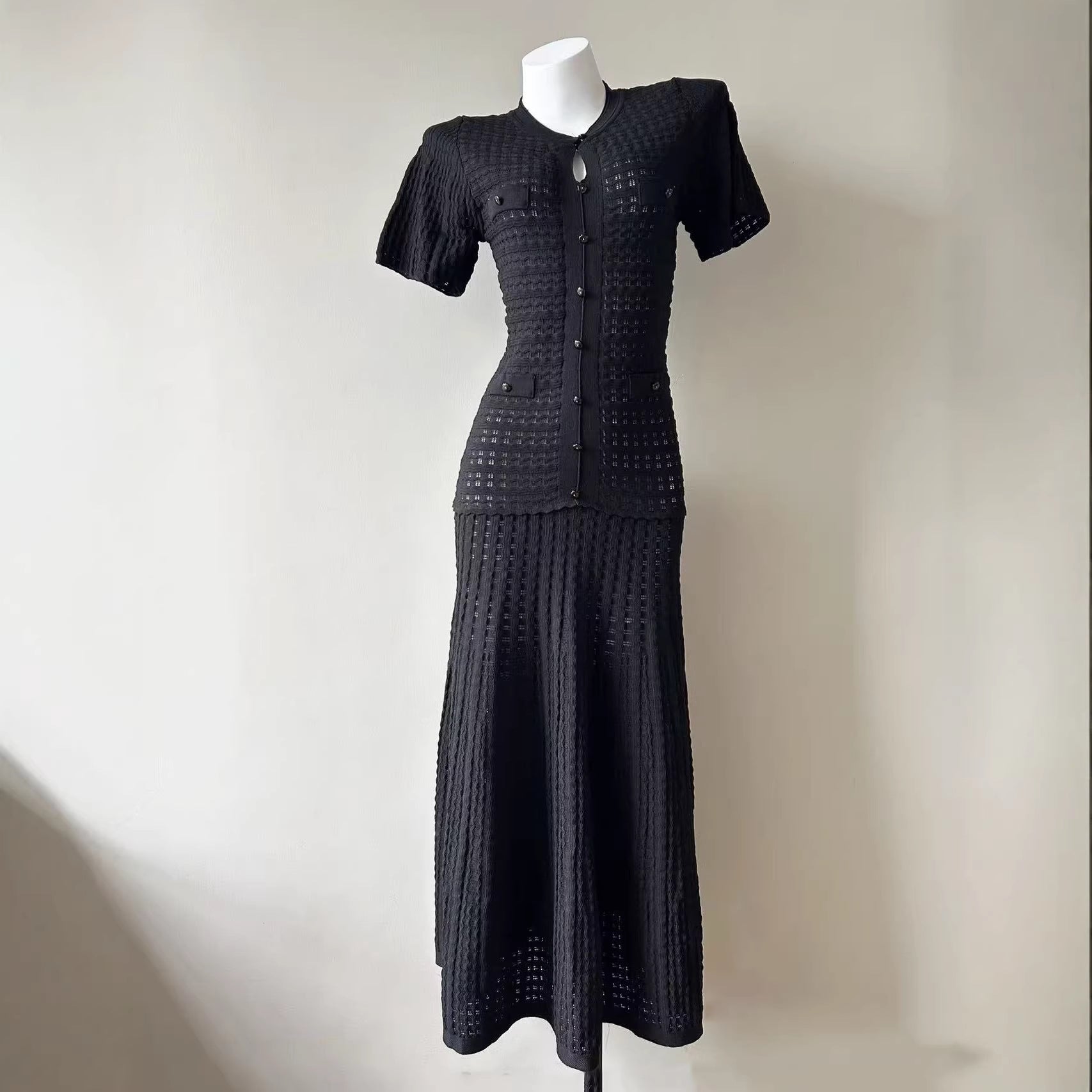 Black pointelle knit button-front maxi dress