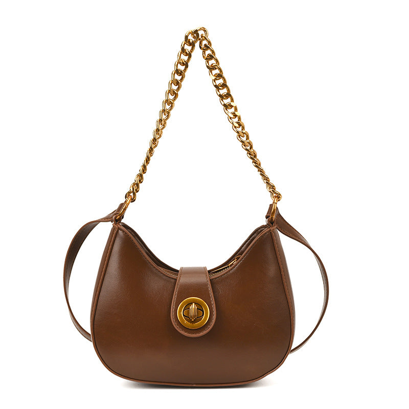 Retro Italian-Inspired Crescent Crossbody Bag — runway angle