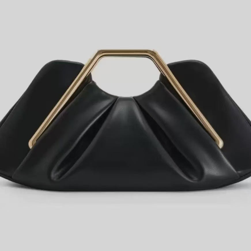 Sculptural Soft Leather Cloud Clutch — side view