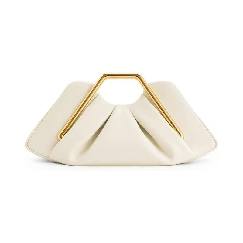 Sculptural Soft Leather Cloud Clutch — model wearing