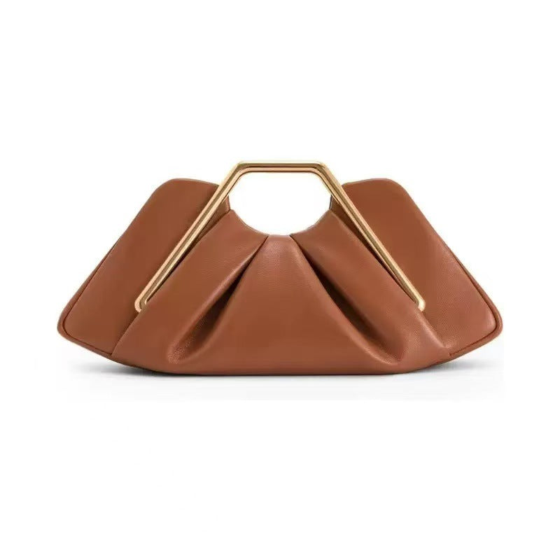 Sculptural Soft Leather Cloud Clutch — runway angle