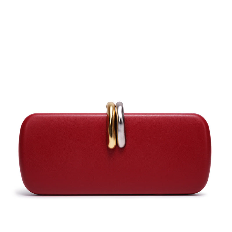 Sculptural Two-Tone Clasp Evening Clutch — trim detail