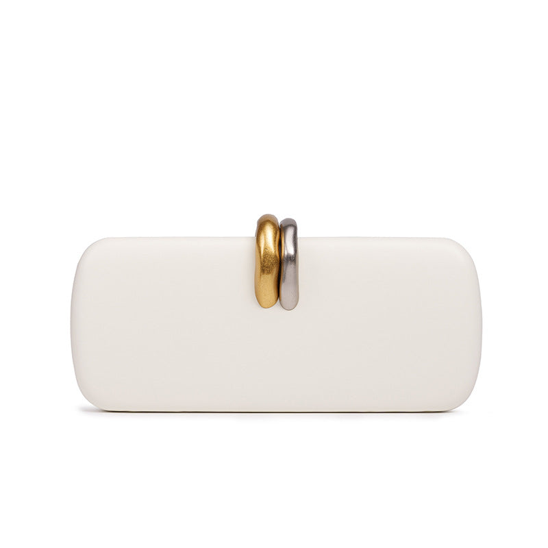 Sculptural Two-Tone Clasp Evening Clutch — close-up detail