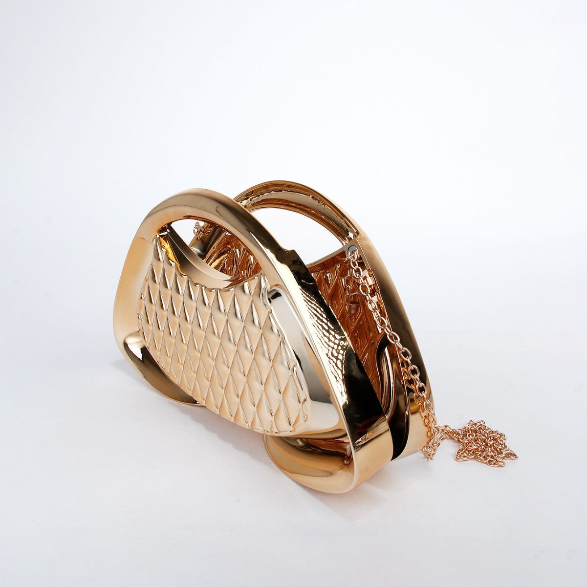 Quilted Metallic Sculpted Clutch — styled look