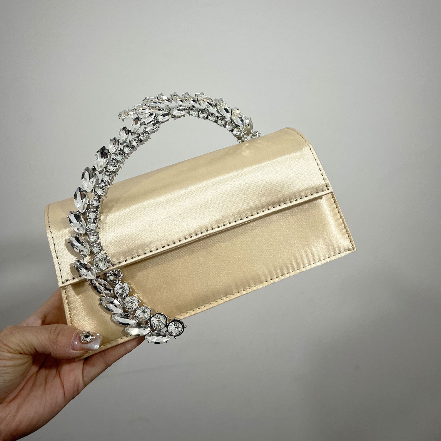 Theia Hardware-Detailed Evening Clutch — hem detail
